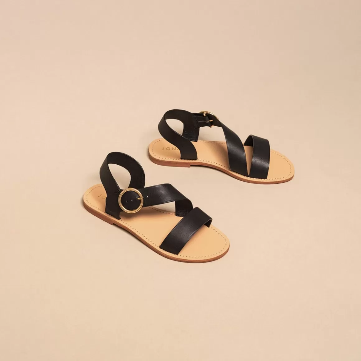 Asymmetrical sandals<Jonak Fashion